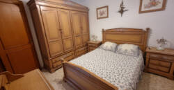 Edificio de 2 viviendas + 1 local comercial