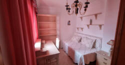 Edificio de 2 viviendas + 1 local comercial