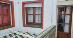 Edificio de 2 viviendas + 1 local comercial